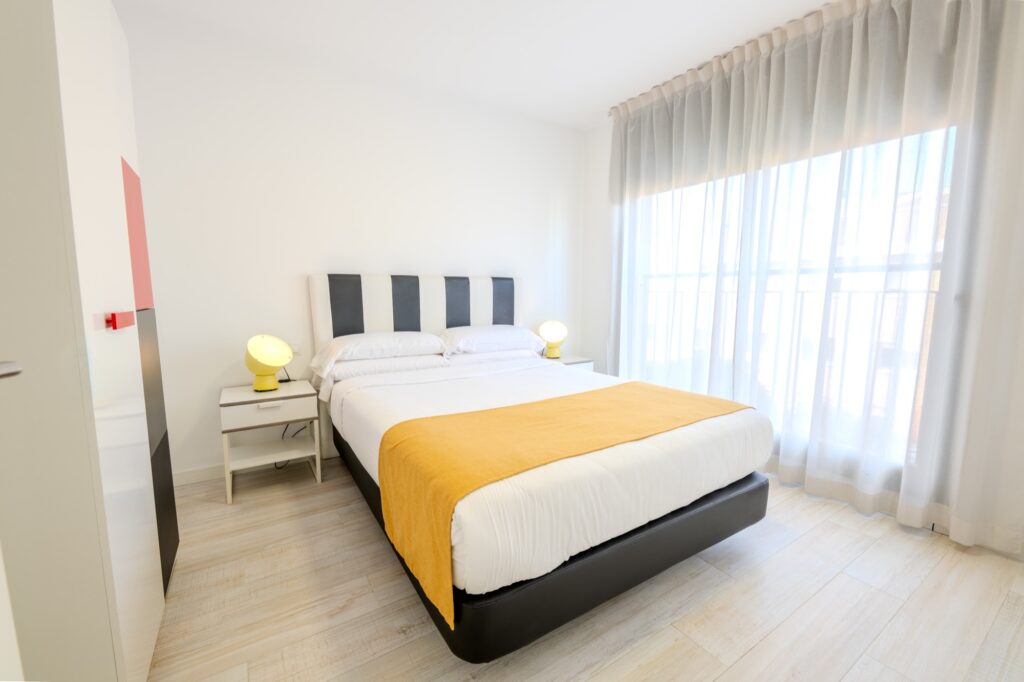 Two-bedroom apartment with a fully equipped kitchen for up to four guests at Castell Beach Aparthotel in Castelldefels